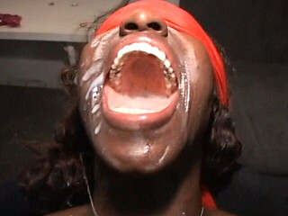 A Black Gangbang Pig Gets Blindfolded Squirted