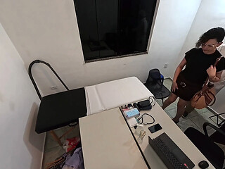Brazilian doctor performs pre-employment medical exam on foreign woman.