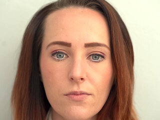 Extreme Close up Blue Eyed Redhead Smoking
