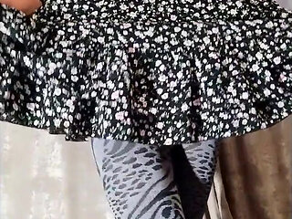 Sissy poses in fitness clothes, tights, and a short dress