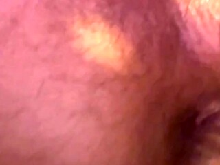 Oiled up beauty rides anal dildo