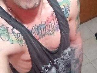 This young man masturbates his beautiful and big penis until he cums with large loads of cum