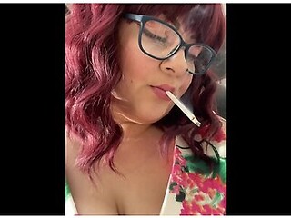 Sweet secretary smoking, alluring and teasing
