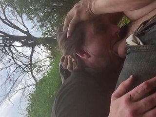 Blowjob by the River