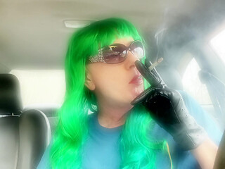 CAR SMOKING A VS120 WITH MY GREEN WEAVE LOL -- YEAH OR NEY?