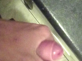 Dirty boy jerks off cock in bathroom with smegma