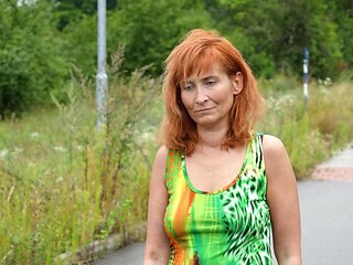 Redheaded Laura Maria gets naughty with her experienced mate in a steamy doggy style session