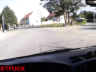 Pretty hot brunette gives a car blowjob to the gentleman stranger