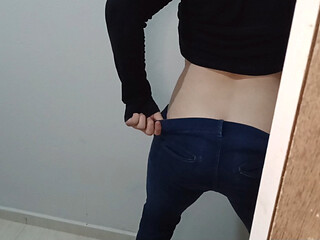 Young guy taking off his pants and showing off his hot ass