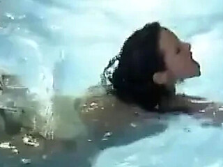 Busty German MILF Takes a Hard Pool Fuck
