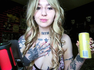 Alternative blonde drinking and burping