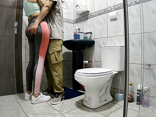 Mistress getting intimate in the bathroom after a workout.