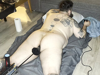Fuck machine fucks my big ass doggy style on the belly