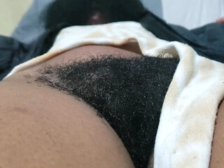 Hairy Star Shows off Her Natural Pussy in a Bold and Intimate Sensual Presence