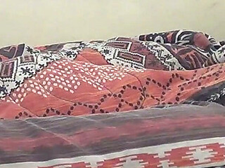 Deep Kissing While Playing with a Strange Object Under the Duvet