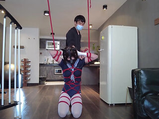 Mz31 - a Girl Tied and Suspended by a Red Rope Reaches Orgasm.