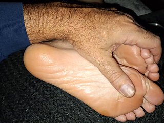 Giving her a nice sensual oily foot massage before bed