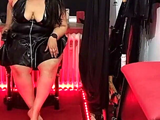 Curvy Latex Mistress Clamps and Dilates Masked Slave