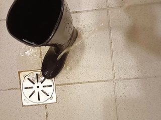 Pissing in her Hunter boots