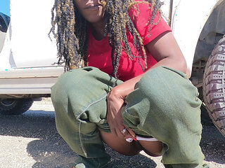 Ebony MILF Taking a Piss Next to the Road and Gets Hubby to Lick Her Pussy Clean After