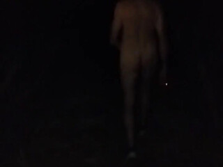 Naked Walking on the Hill Along Highway