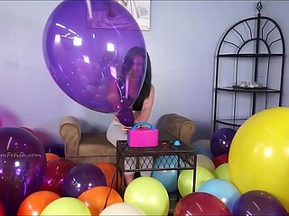 Hot looners pop and play with balloons at a party
