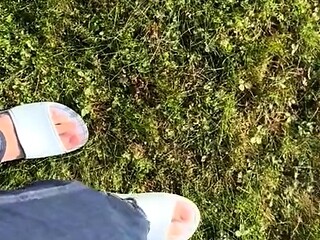 Brunette with foot fetish rubs big dick with her feet in POV