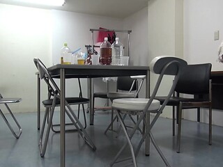 After being left alone in a room, she stroked her clit before a man arrived.