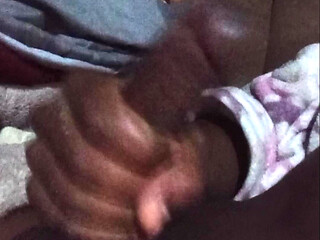 Masturbating
