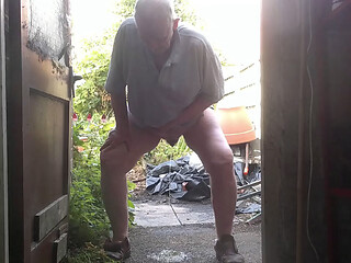 Old man pisses