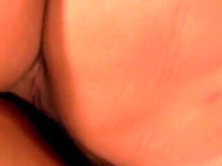 Sultry Lesbians Caressing and Kissing Passionately