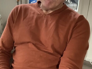 Jerking off and cumming in my orange sweater