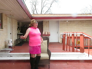 Brittney CD modeling her new pink outfit and boots