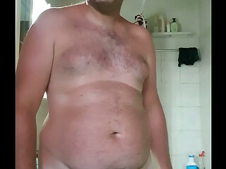 Nude boy in bathroom
