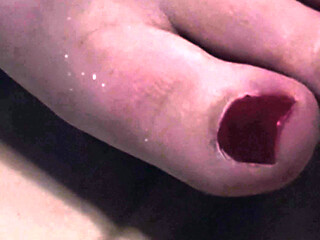 Sexy Red Toes in Bed