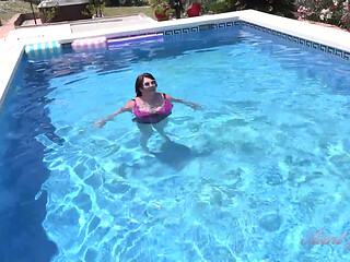 Busty Redhead MILF JoJo Robinson Goes Skinny Dipping in the Pool