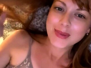 Amateur redhead Jacqueline with glasses masturbates