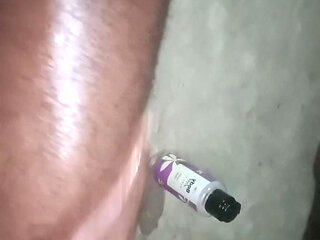 Putting oil on my body & also to my buddy  ...