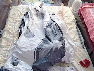 Sensual massage of a hot amateur couple with oil on the body.