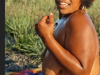 DRONE CATCHES  BLACK BBW MASSAGING HER BODY IN NATURE