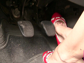 Sexy Barefeet Pedal Pumping in Scarlet Buckled Flats