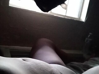 Hot wife masturbates in front of hotel window for her husband's pleasure