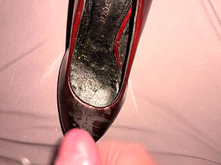 Cumming on red and black patents