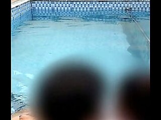 Curvy couple enjoys a wet and wild swimming pool session