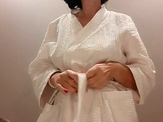 She knitted a blue accountant and tried on the details on her nipples