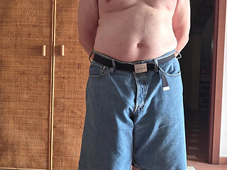 Horny stock guy making a qui wank in his bermuda