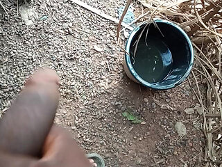 A guy is masturbating in his local African bathroom  kpekus arena