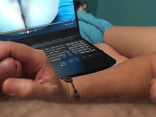 Watch Bella Spank His Cock While Watching Porn