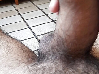 Lying on the bed of hard cock