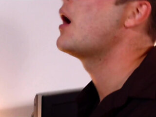 Sharon Pink gets in the office and puts those great massive tits of hers in his face.